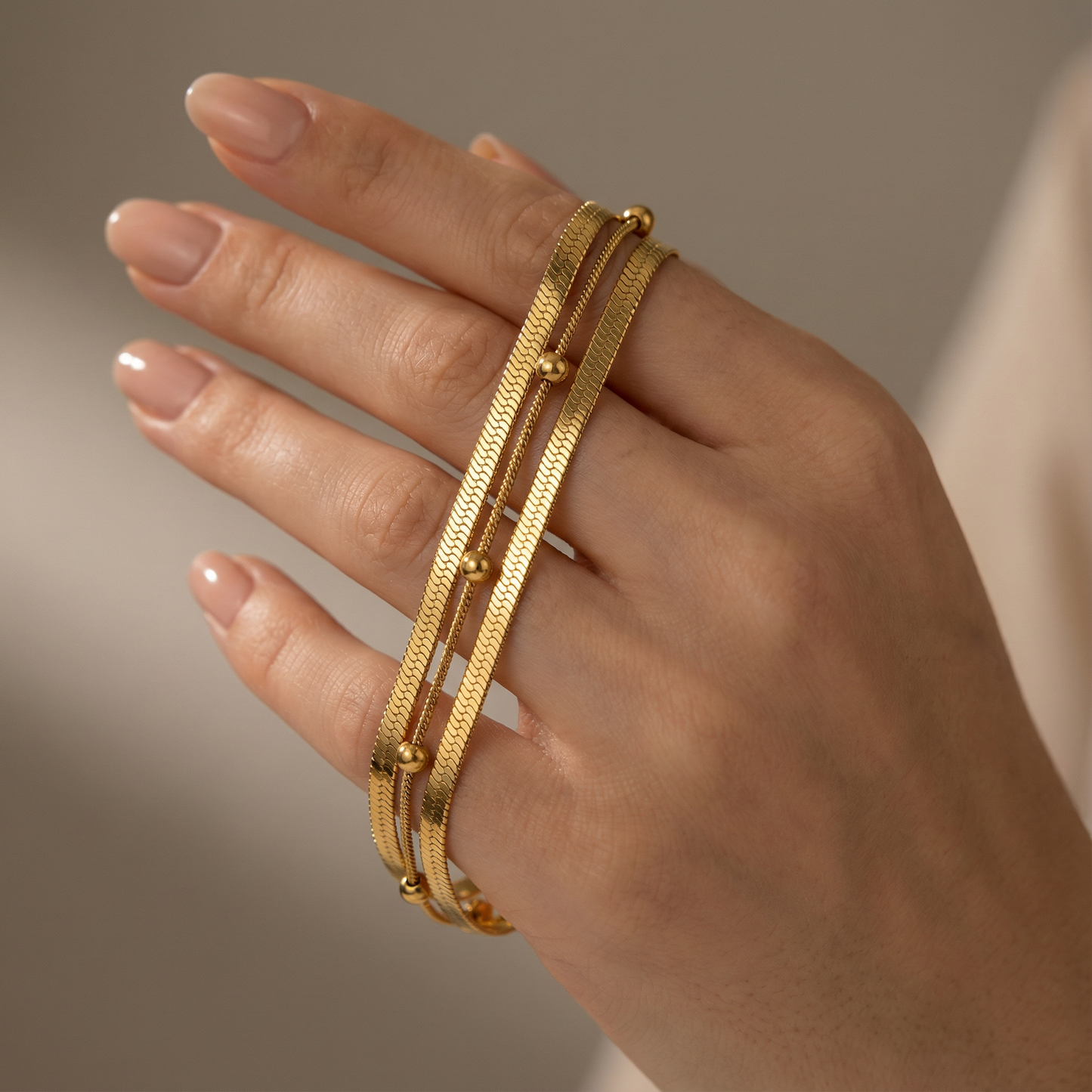 Elegant Triple-Layer Gold Bracelet